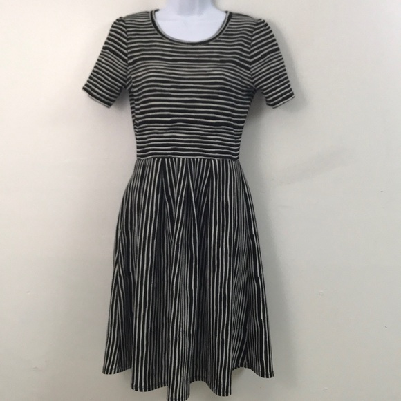 LuLaRoe Dresses & Skirts - Show of your shape in this black and white LuLaRoe